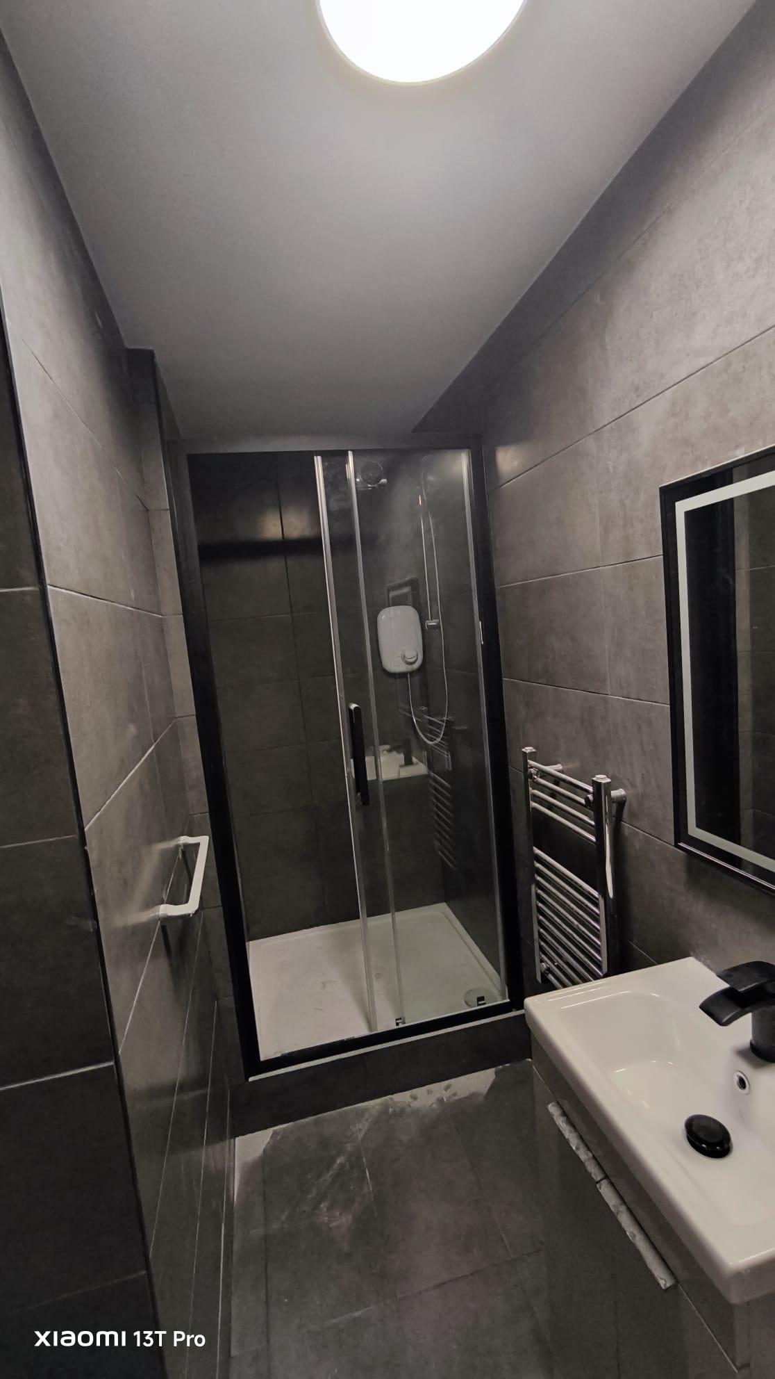 Modern gray tiled bathroom