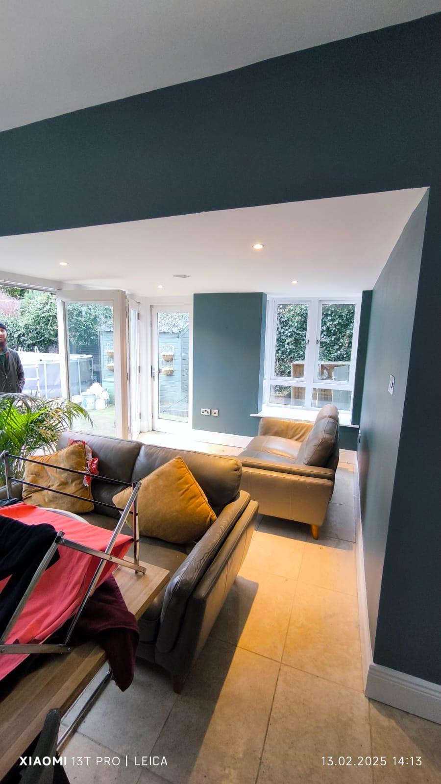 Teal living room with natural light